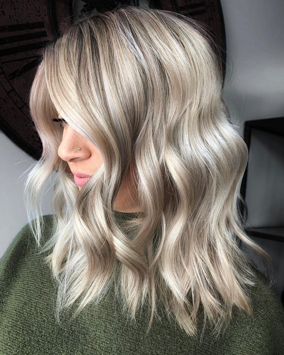 Embrace the elegance of light blonde with subtle lowlights, adding depth and dimension for a stunning, sun-kissed look! ✨💇‍♀️ #BlondeGoals #HairInspo