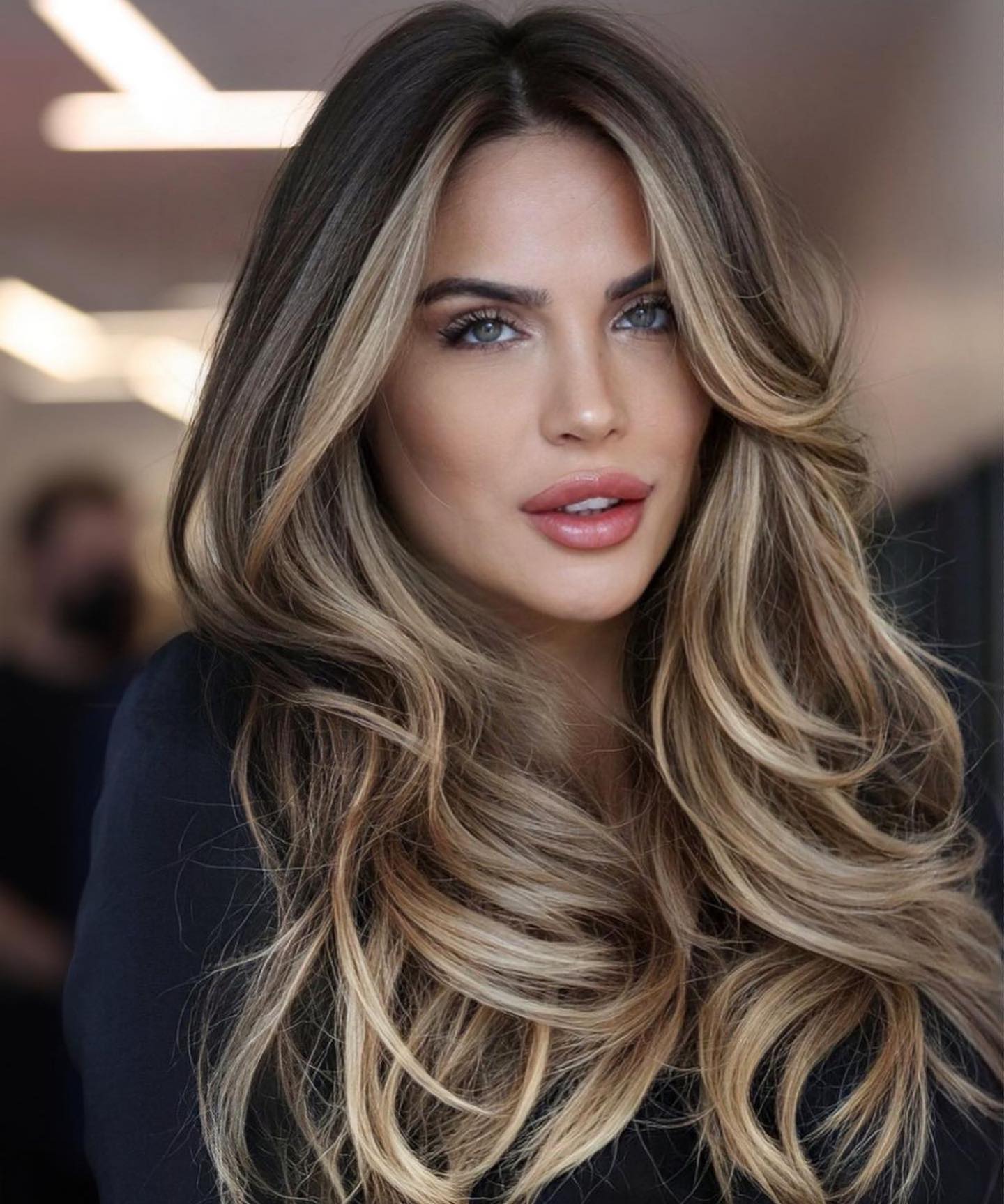 Embrace the beauty of this stunning dirty blonde hairstyle, accentuated with sun-kissed highlights that bring out a radiant, effortless glow. Perfect for adding dimension and warmth to your look!