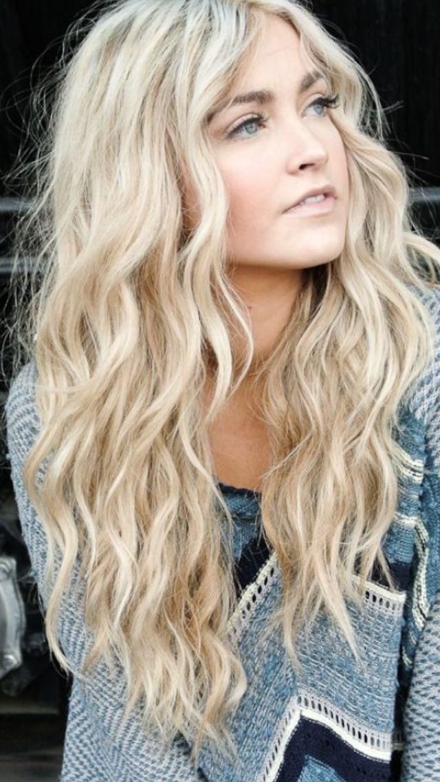 Effortlessly chic and radiant, this long blonde hairstyle exudes elegance and versatility. Perfect for any occasion, it highlights a stunning blend of warm and cool tones that catch the light beautifully!