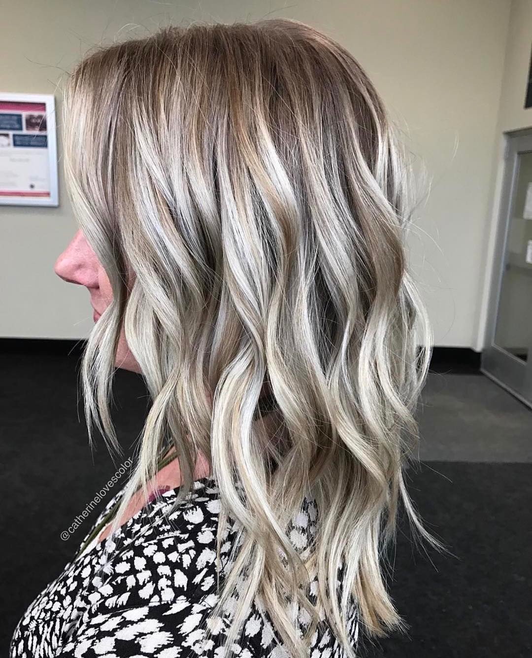 Embrace the elegance of ash blonde! This chic hairstyle perfectly blends sophistication and style, making it a stunning choice for any occasion. 💫✨ #HairGoals #AshBlonde