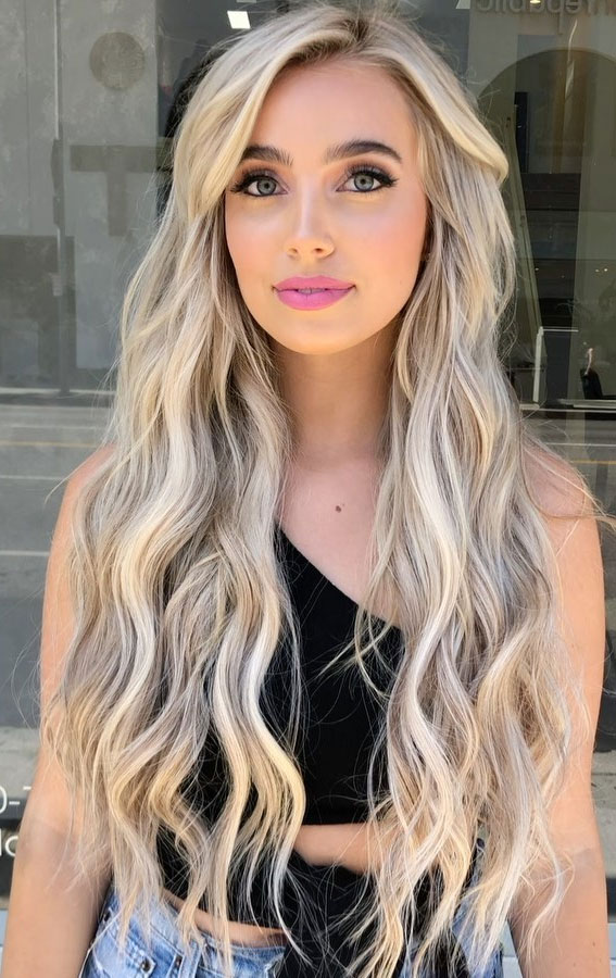 Radiating confidence with this stunning blonde hairstyle! Effortlessly chic and perfect for any occasion, this look embodies elegance and style. ✨💛 #BlondeAmbition #HairGoals