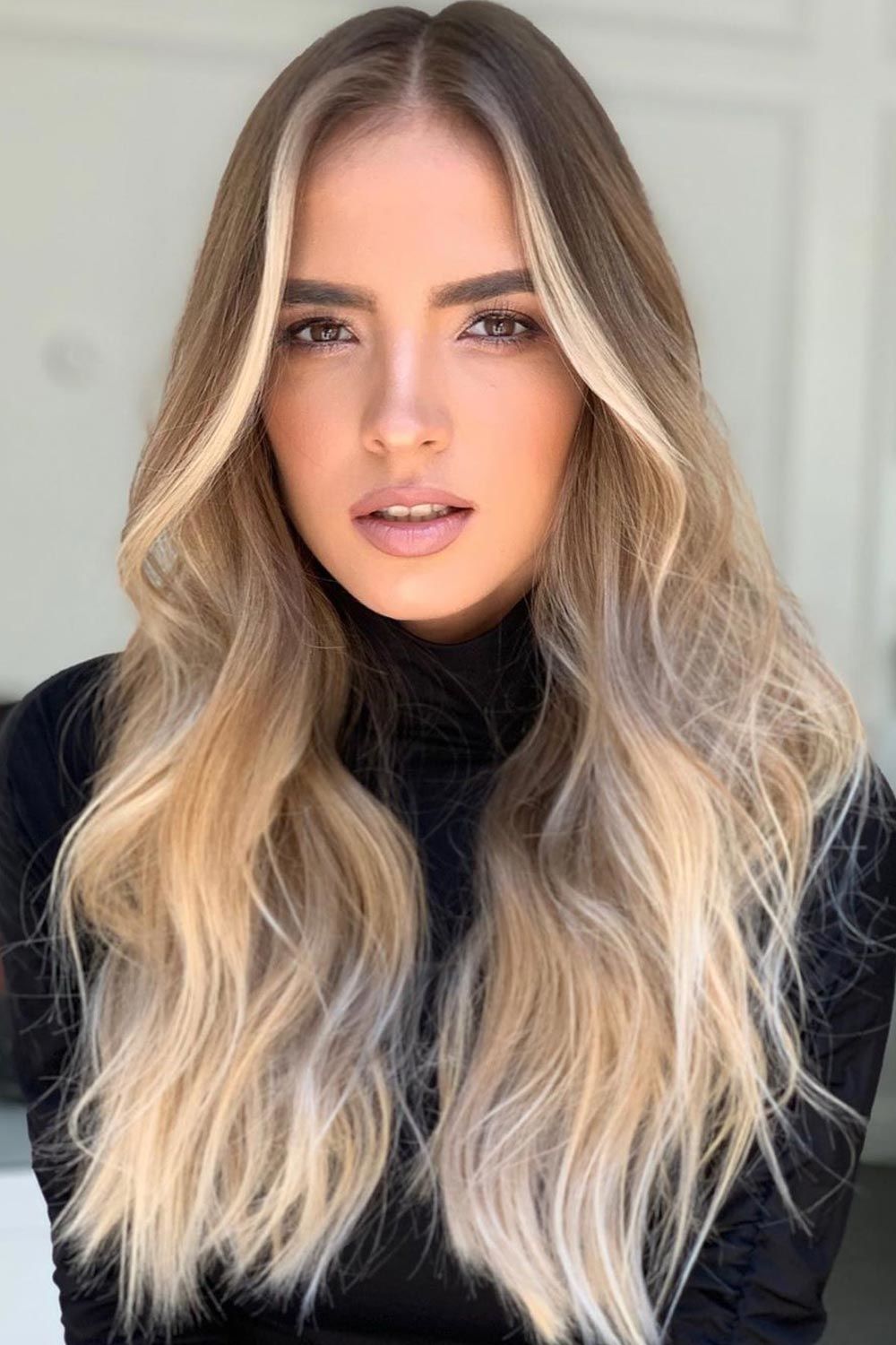 Embrace the elegance of dark blonde ombre—where rich, warm tones seamlessly blend for a stunning, sun-kissed look. Perfect for adding depth and dimension to your style!