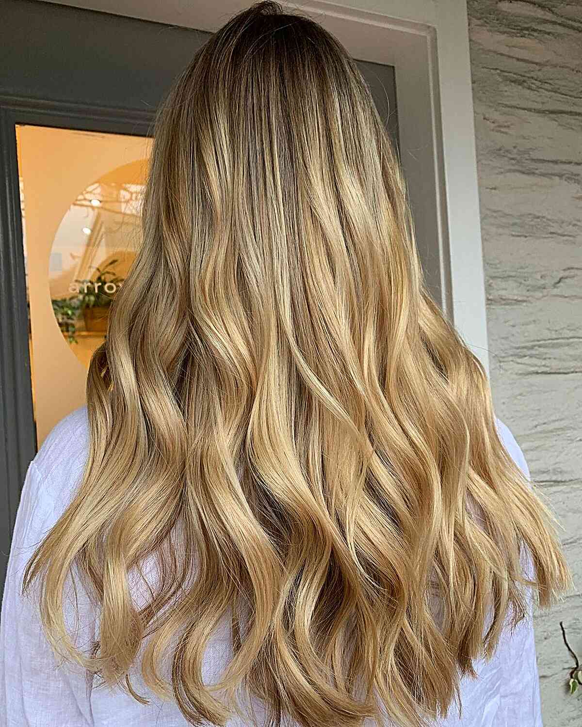 Embrace the radiant glow of melted golden blonde balayage—a perfect blend of warmth and dimension that captures the essence of effortless elegance!" ✨💛 #HairGoals #BalayageBeauty